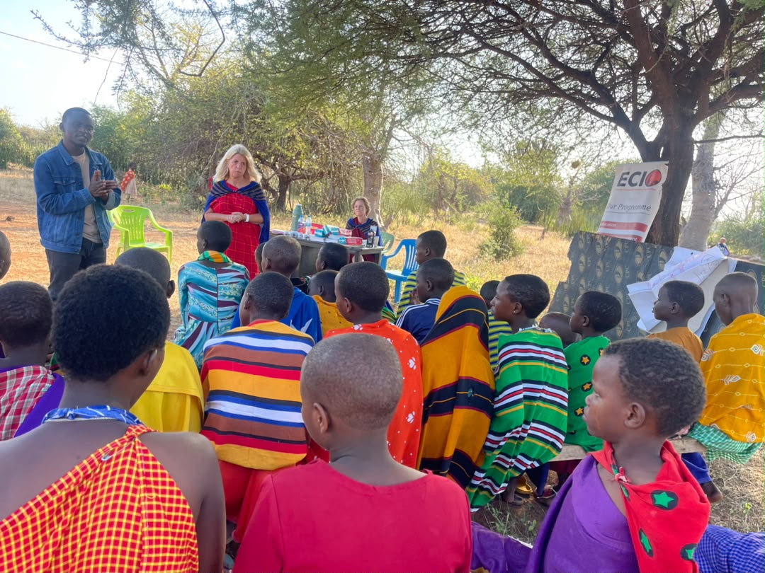 ECIO — children at a community programme — 1400×960